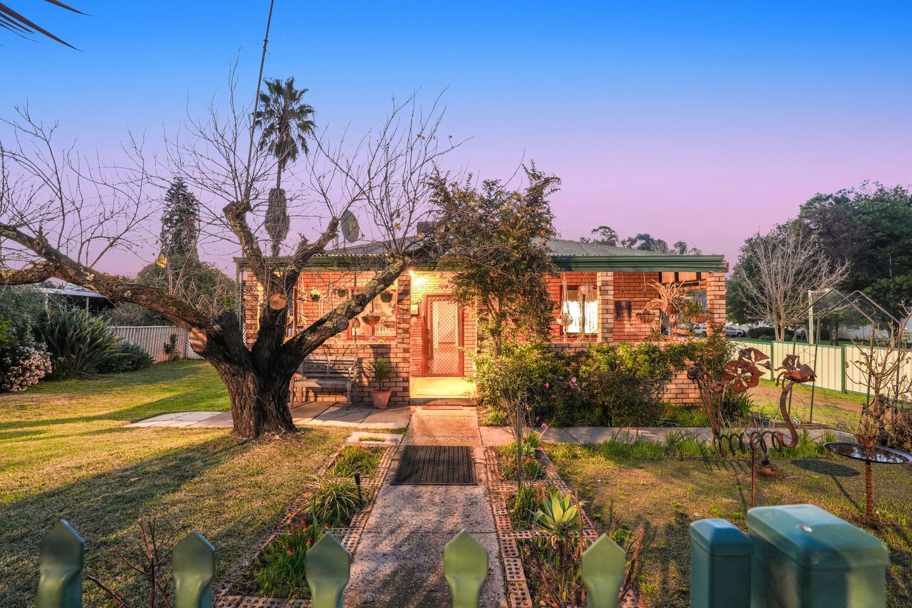 "Home Among the Fruit Trees" Charming Character Cottage with Established Gardens and Endless Potential