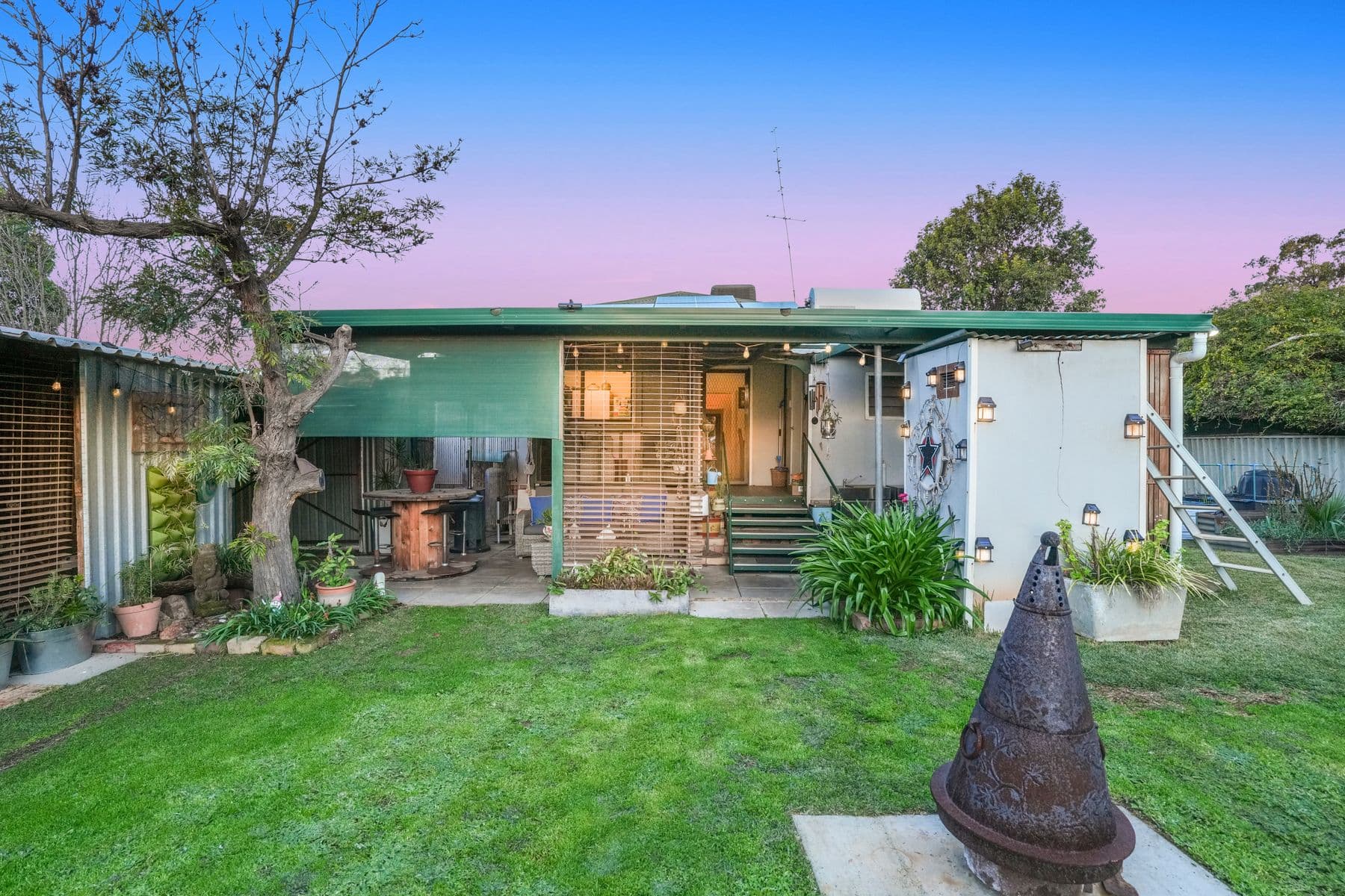"Home Among the Fruit Trees" Charming Character Cottage with Established Gardens and Endless Potential — photo 2